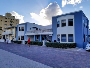 view of Sandpiper from beach. Unit 4 is the main floor unit on the left.
