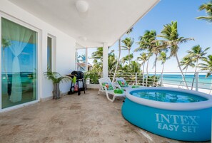 Enjoy your time on a private terrace with an inflatable pool.