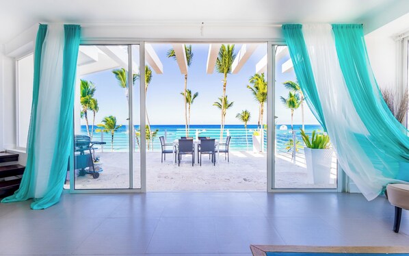 Your perfect 4-bedroom beachfront gateway!