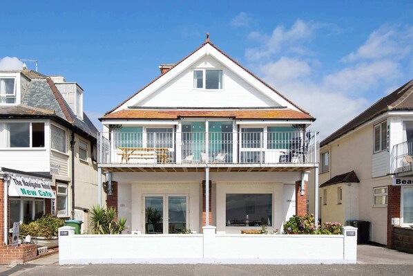 The stylish beachfront home full of character and charm right on the promenade