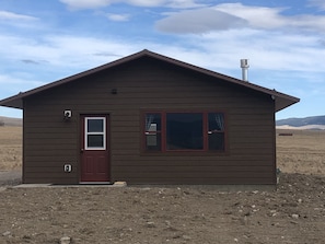 Front Porch with parking on the left will accommodate RVs.