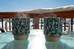 Enjoy a cup of coffee on the personal deck