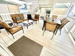 Fabulous covered deck with plenty of seating.