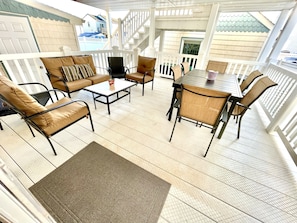 Fabulous covered deck with plenty of seating.