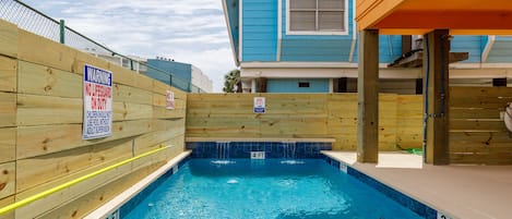 Come relax at the pool after a day at the beach.