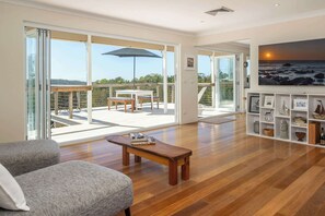 Light filled open plan living space with direct access to the rear patio