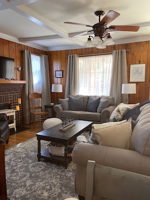 Living room, couch is equipped with queen size sleeper