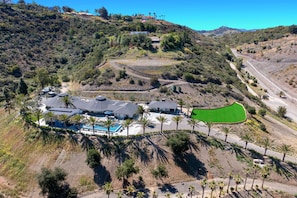 Hilltop luxury with sweeping views and total privacy all around!