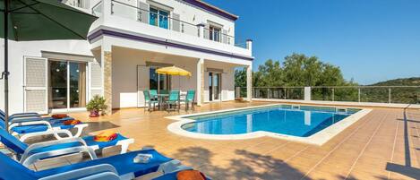 Sky, Building, Property, Swimming Pool, Furniture, Window, Azure, Water, Shade, Outdoor Furniture