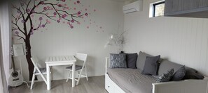Lounge area with table & chairs - Day bed 
@ Frankland River Chalet Retreat