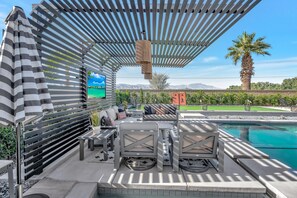 Custom built steel shade with outdoor TV, watch movies under the stars from the jacuzzi and heated pool with underwater speakers!