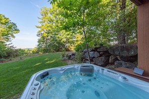 Soak in the brand-new hot tub after a full day of adventures!
