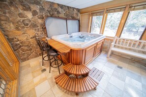 Private hot tub with attached bar top seating!