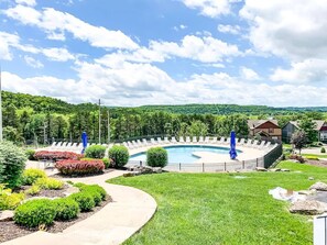 Soak up the sun in one of the many lounge chairs around the neighborhood pool! Open seasonally! 