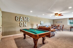 The basement game room will be a huge hit for everyone in your group!