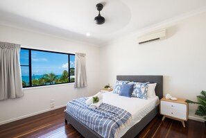 Spacious bedrooms with air conditioning and view