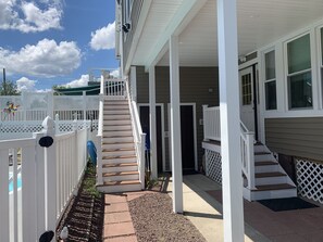 BACKYARD STAIRS TO 2ND FLOOR / OUTDOOR BATHROOM DOOR BOTTOM RIGHT