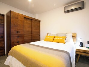 Spacious second bedroom featuring ample closet space—ideal for guests or extended stays.
