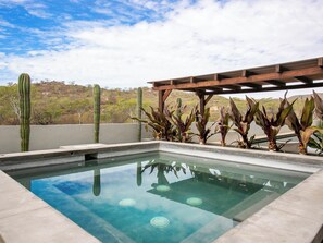 Rooftop hot tub with stunning views of Land’s End—relax and soak in the beauty of Cabo.
