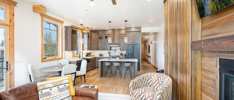 The kitchen, living room & dining area are open concept so your group has plenty of space to connect together.