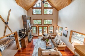 Your Quintessential Mountain Home Soaring ceilings, wall of windows, gleaming floors and comfortable Great Room!