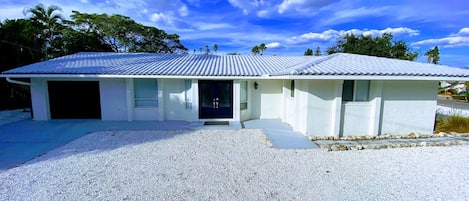 Welcome home to 501 De Narvaez Drive, Longboat Key, FL 34228