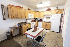 Kitchen w/ Adjustable table & chairs for 4