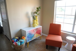 Cozy seating area with games