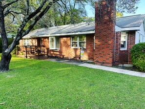 Beautifully maintained 1950's Brick Ranch with ramp to front door. *Spring Photo