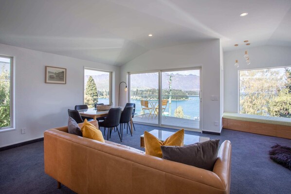 Spacious lounge and dining area with stunning views - NZ luxury travel
