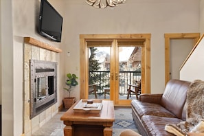 Fireplace and vaulted ceilings in the living room