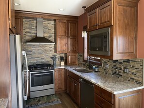 Well stocked kitchen with everything you need to whip up a memorable meal