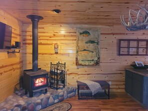 The fireplace is warm and inviting! Firewood available for purchase.