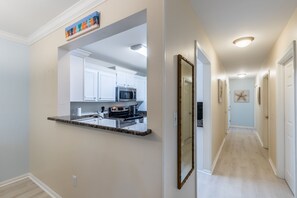 Hallway to bedrooms and bathrooms