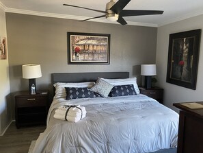 Generous welcoming master suite with fine tones and French-themed
Decor