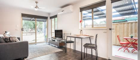 Open plan dining area with large windows and lots of light