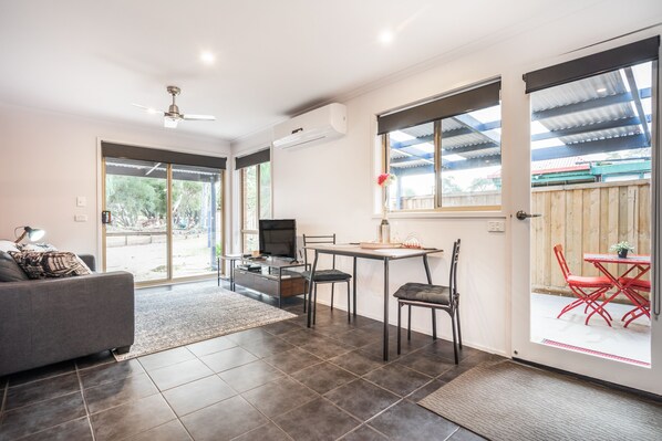 Open plan dining area with large windows and lots of light