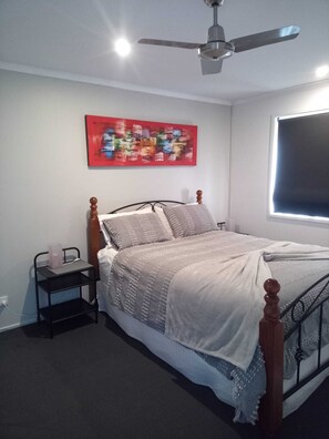 Bedroom with comfortable queen size bed
