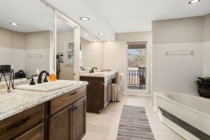 Master bath with double vanity and sinks 