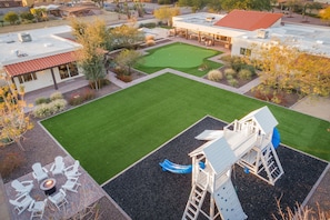 Backyard view with outdoor play set
