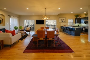 Living room and kitchen - Spacious with beautiful wood floors!