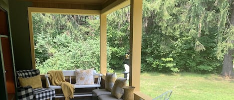 Relaxing front porch. Great spot for coffee in the morning.