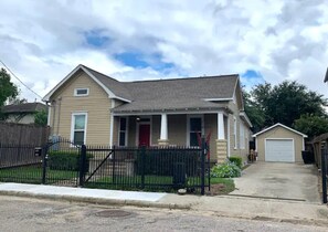 Our Bungalow Features Plenty of Parking, a Gated Driveway, and an EV Charger