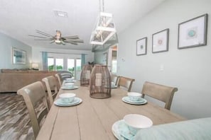 Beautifully decorated dining room table with views of the ocean