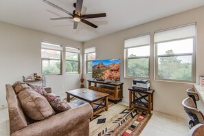 Living Room with a Sleeper Sofa and a 60" Smart TV