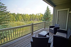 Back Deck, Blue River is by those trees