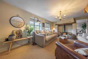 Evergreen, Thornage: A cosy fireside sitting area
