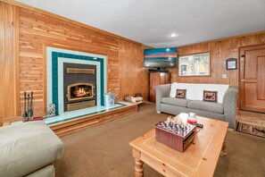 Living Room. - Adorable Living Room with plenty of comfy seating, TV&#39;s and a fireplace!