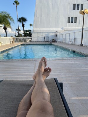Relaxing by the pool