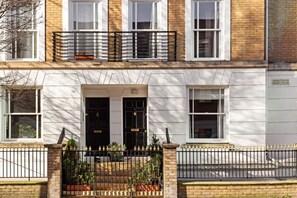 Entrance to Ground floor flat
With security gate in front of entrance.